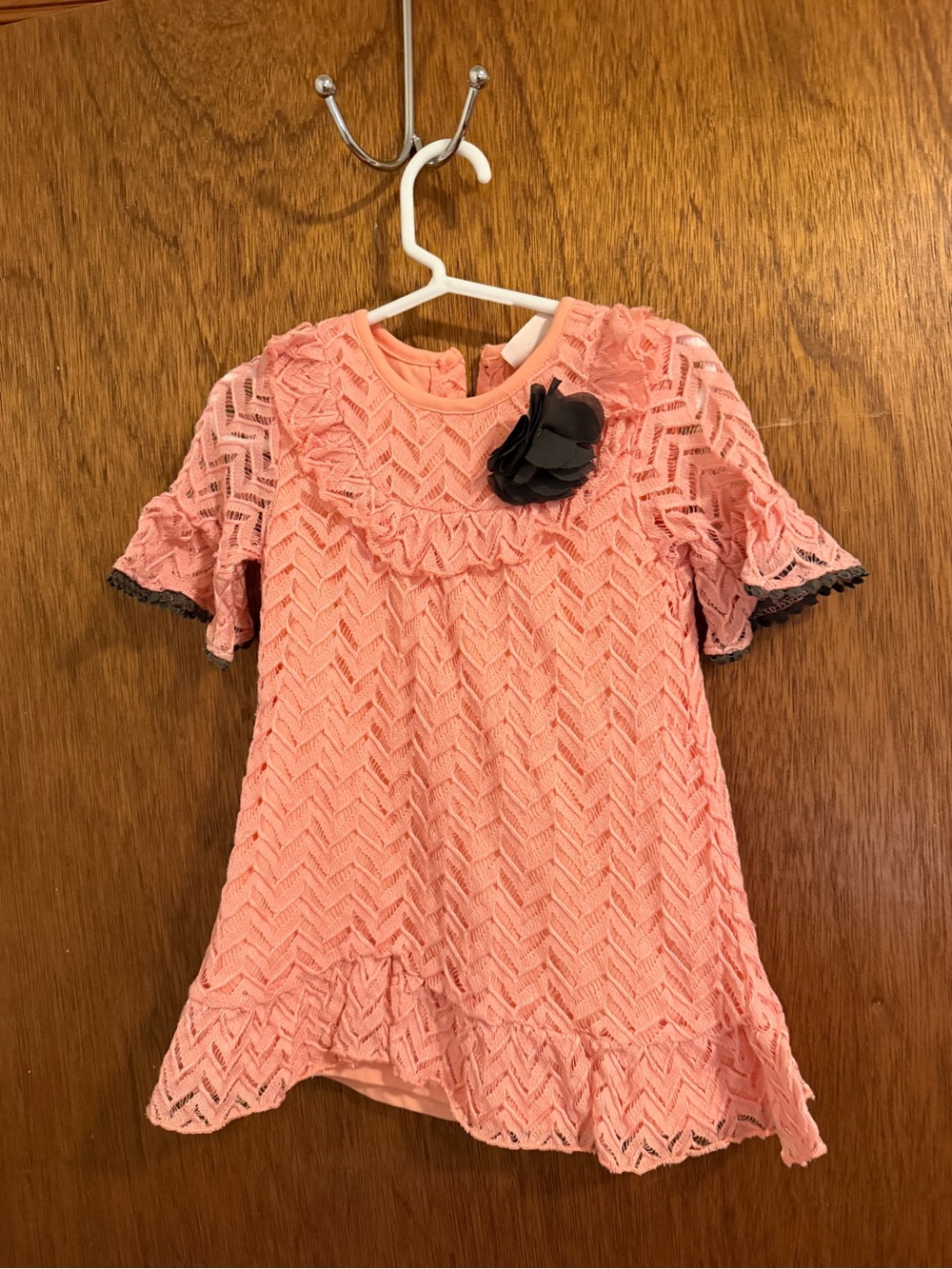 Little Lass Peach Lace Dress with Black Flower Accent